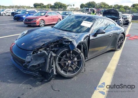 2014 Porsche 911 Carrera z USA, uszkodzony, nr VIN WP0AA2A99ES107148